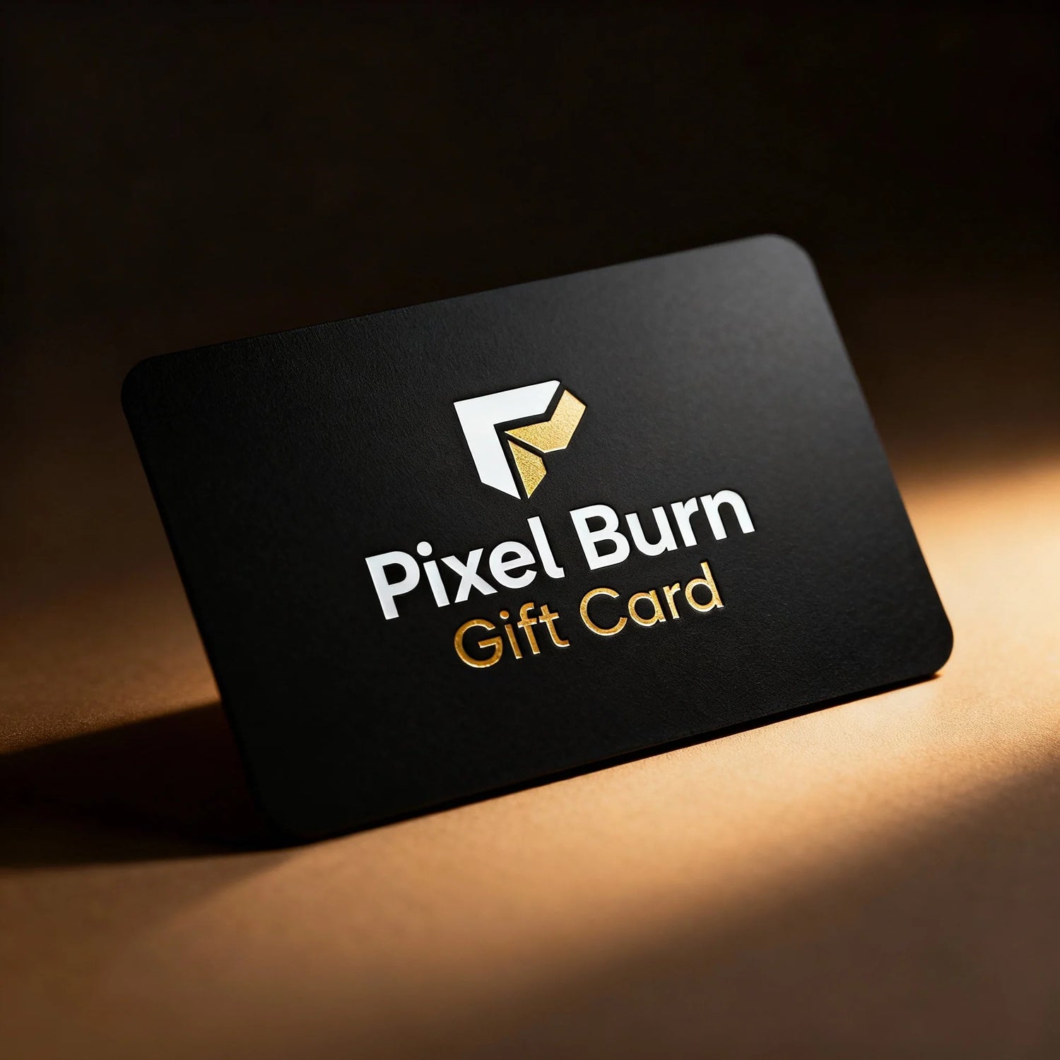 Black Pixel Burn gift card with gold and white logo on a brown background
